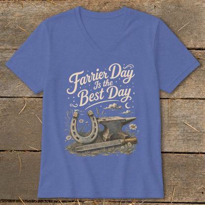 Blue v-neck t-shirt with "Farrier Day Is the Best Day" text and horseshoe, anvil, and rasp design.