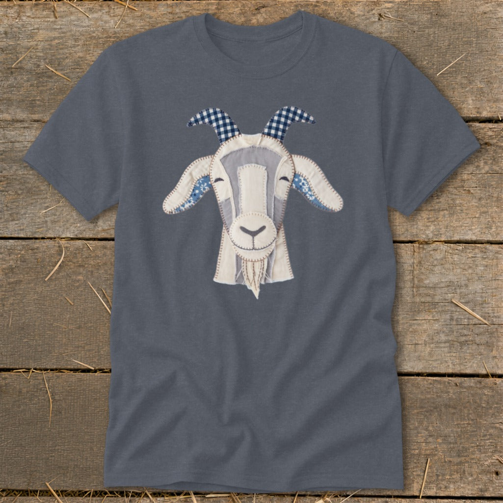 Gray t-shirt with a stitched appliqué of a smiling goat's head.