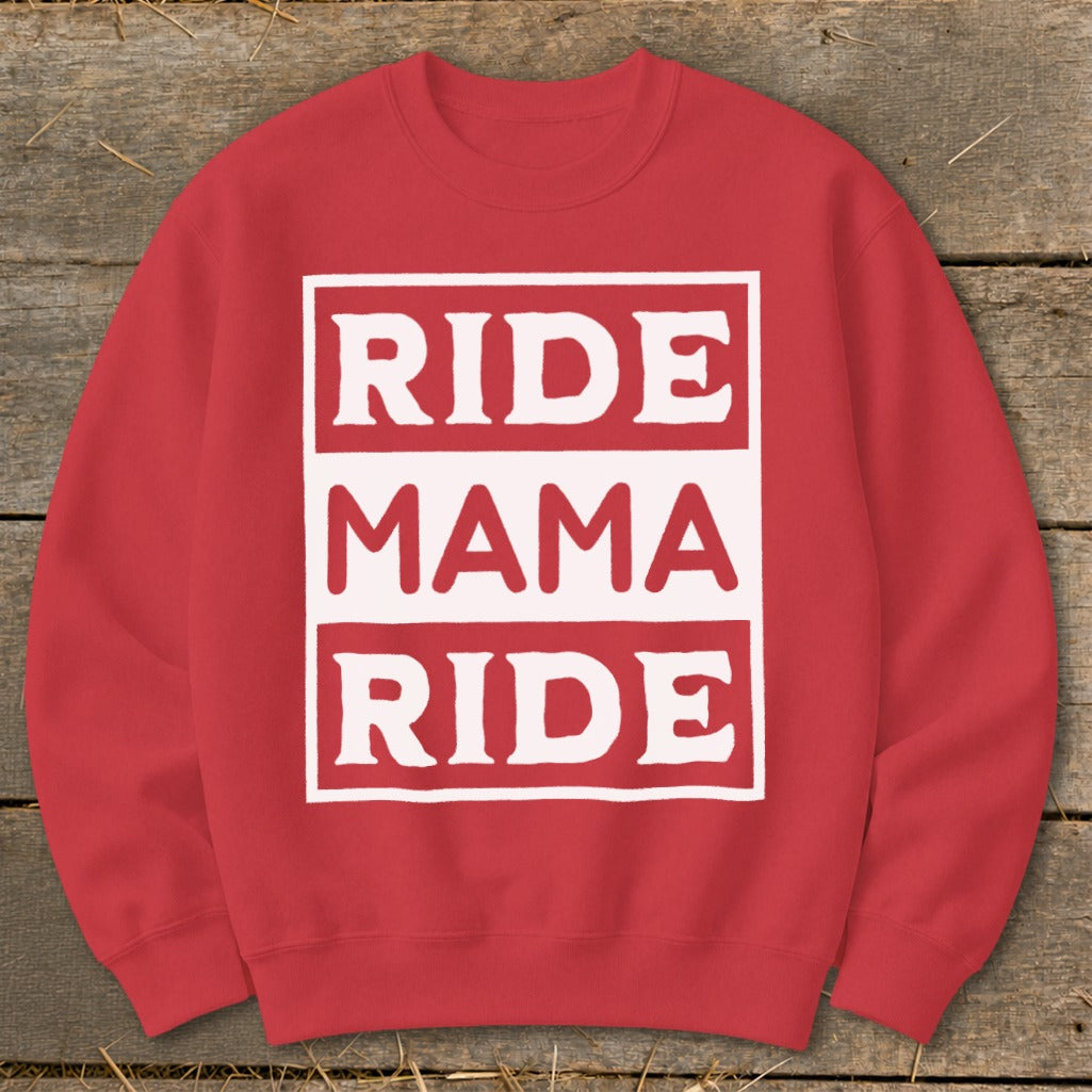 Red crewneck sweatshirt with white text "RIDE MAMA RIDE" in stacked boxes.