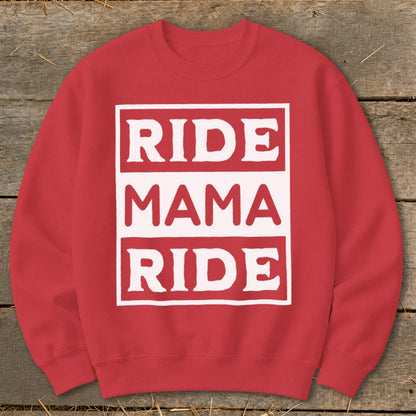 Red crewneck sweatshirt with white text "RIDE MAMA RIDE" in stacked boxes.