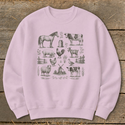 Light pink crewneck sweatshirt with a vintage farm animal sketch print.