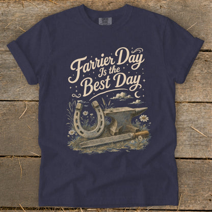 Navy t-shirt with "Farrier Day Is the Best Day" artwork featuring horseshoe, anvil, and file.