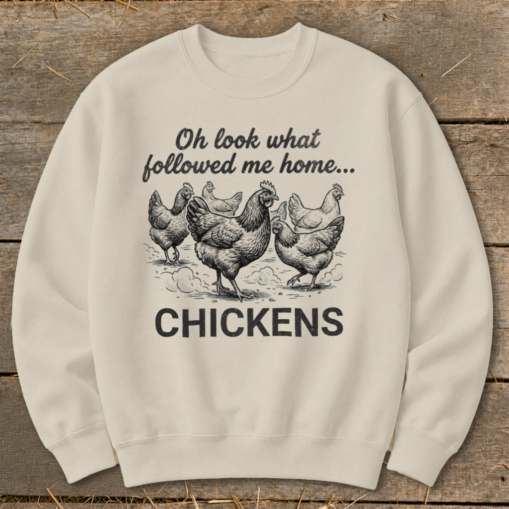 Crewneck sweatshirt with "Oh look what followed me home... CHICKENS" text and chicken illustration.