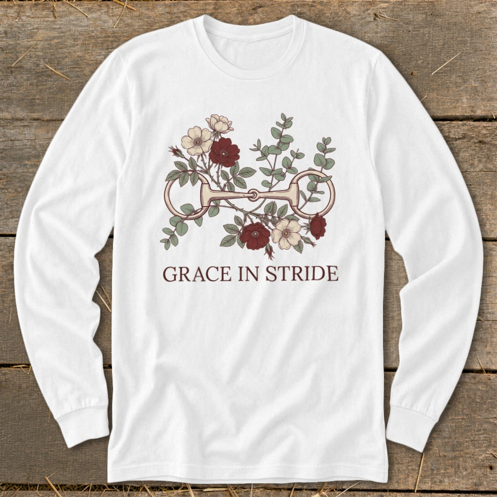 White long-sleeve shirt with floral horse bit design and "GRACE IN STRIDE" text.