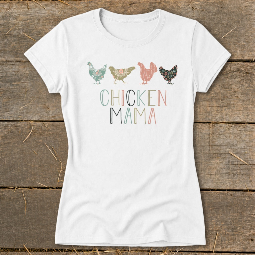 White t-shirt with four floral patterned chickens and "CHICKEN MAMA" text.