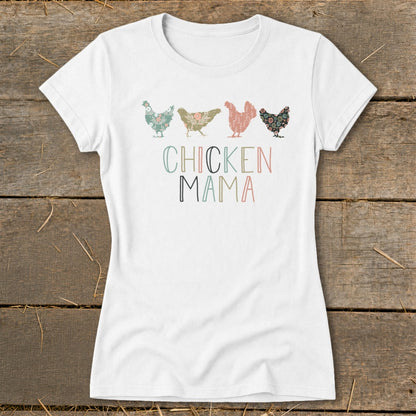 White t-shirt with four floral patterned chickens and "CHICKEN MAMA" text.
