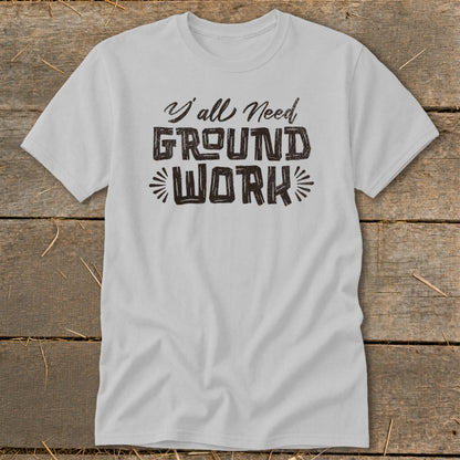 Light gray t-shirt with "Y'all Need Ground Work" text in a distressed font.