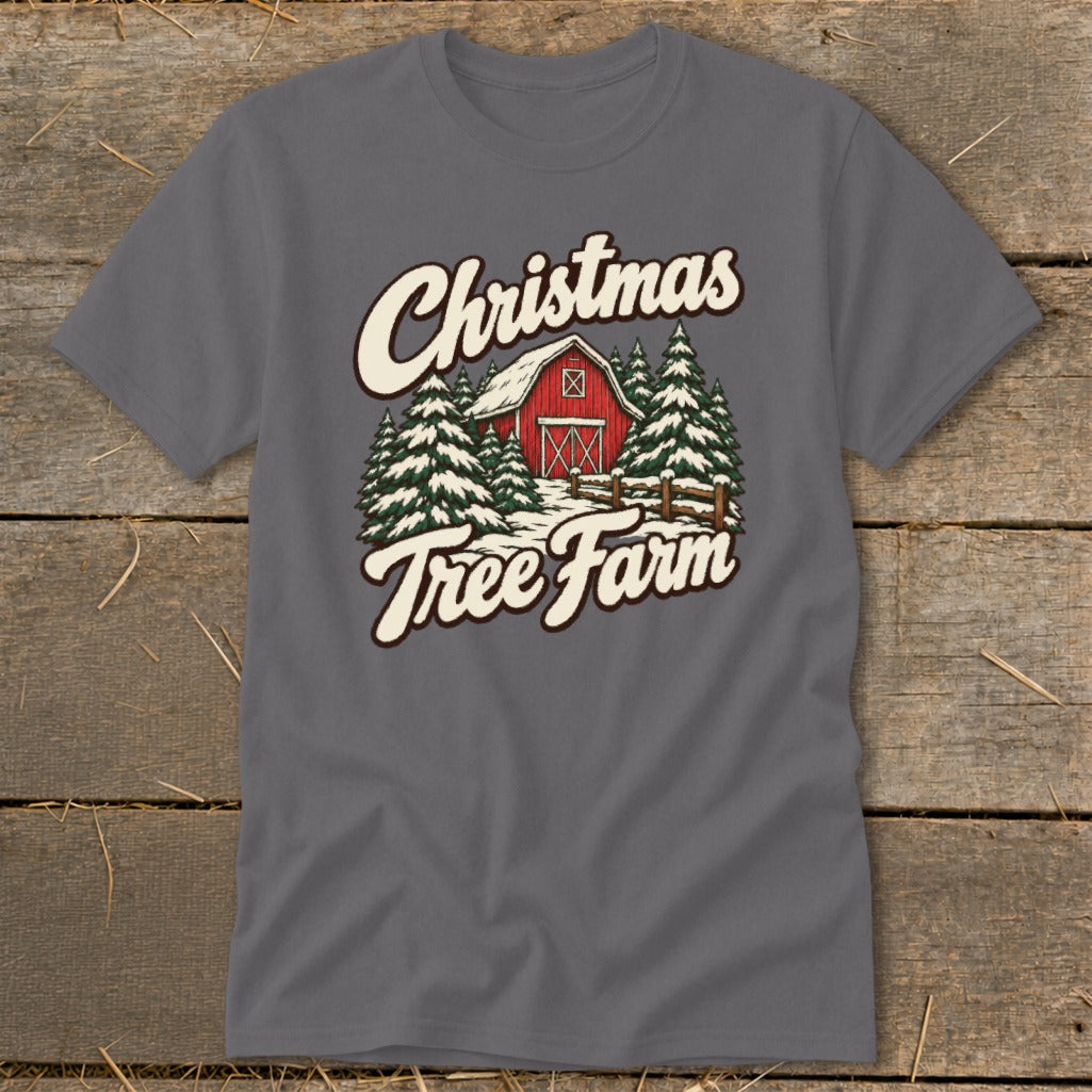 Christmas Tree Farm graphic on a grey t-shirt with a barn and trees.