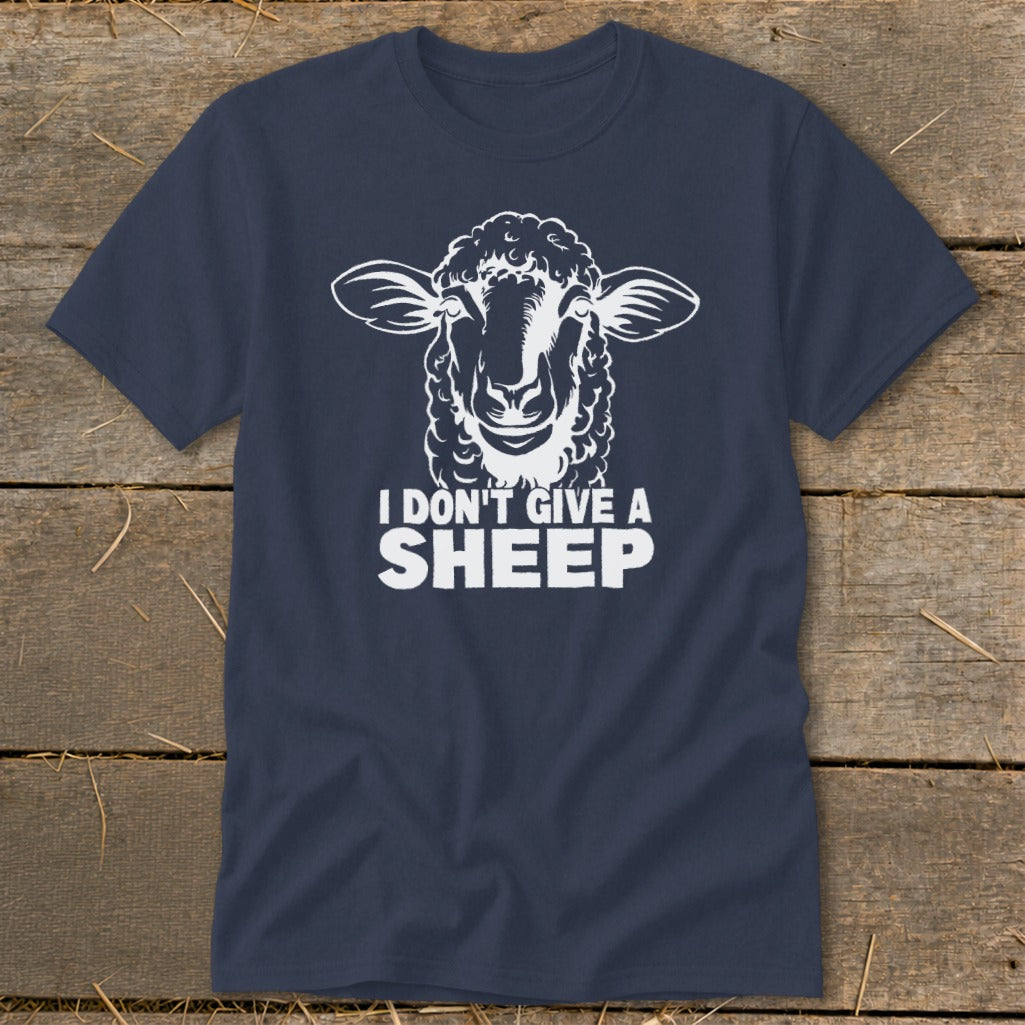 Navy t-shirt with white graphic of a sheep's head and text "I DON'T GIVE A SHEEP".