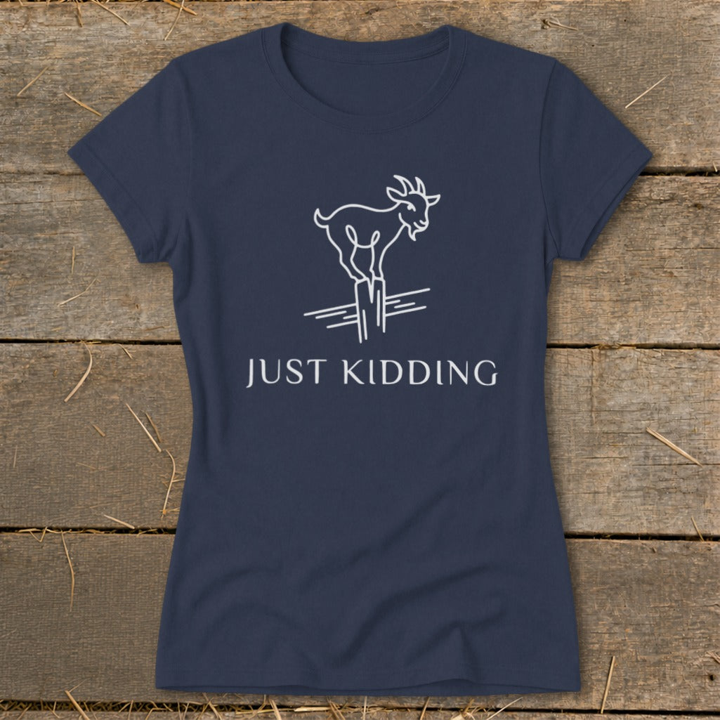 Navy t-shirt with white line drawing of a goat standing on fence posts, reading "JUST KIDDING".