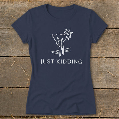 Navy t-shirt with white line drawing of a goat standing on fence posts, reading "JUST KIDDING".