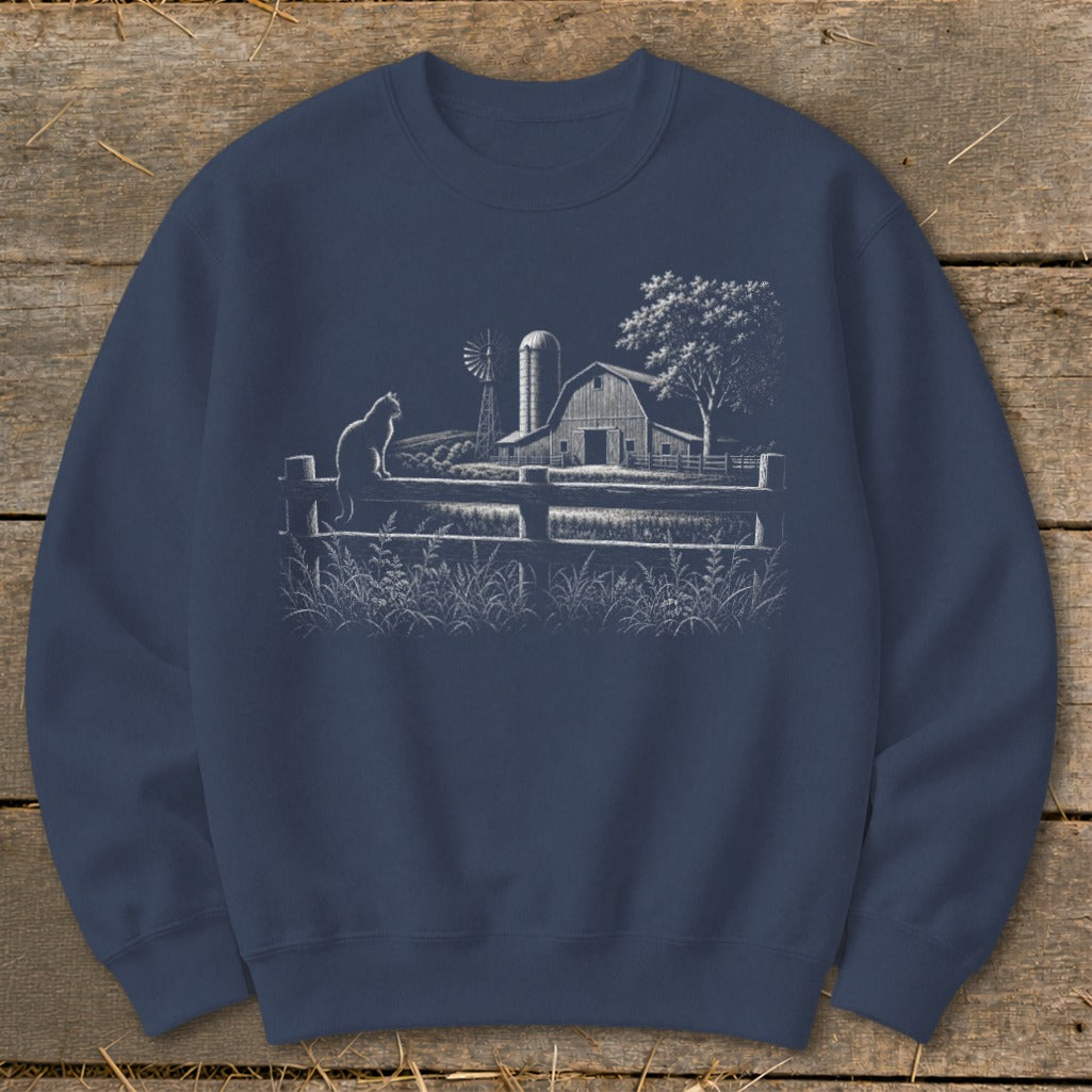 Navy sweatshirt with a white line drawing of a cat on a fence, barn, and windmill.