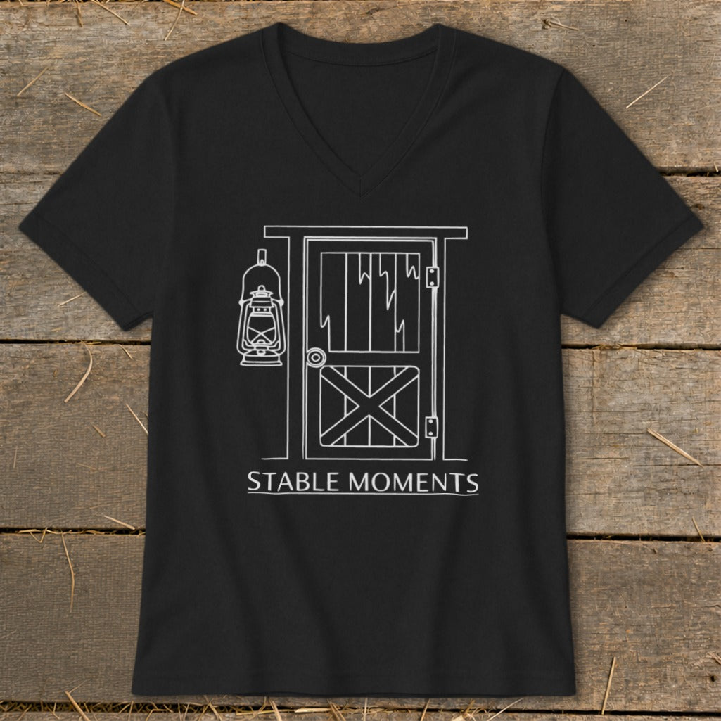 Black t-shirt with white line drawing of a stable door and lantern, reads "STABLE MOMENTS".