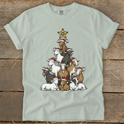 Goats wearing Santa hats form a Christmas tree shape topped with a star.