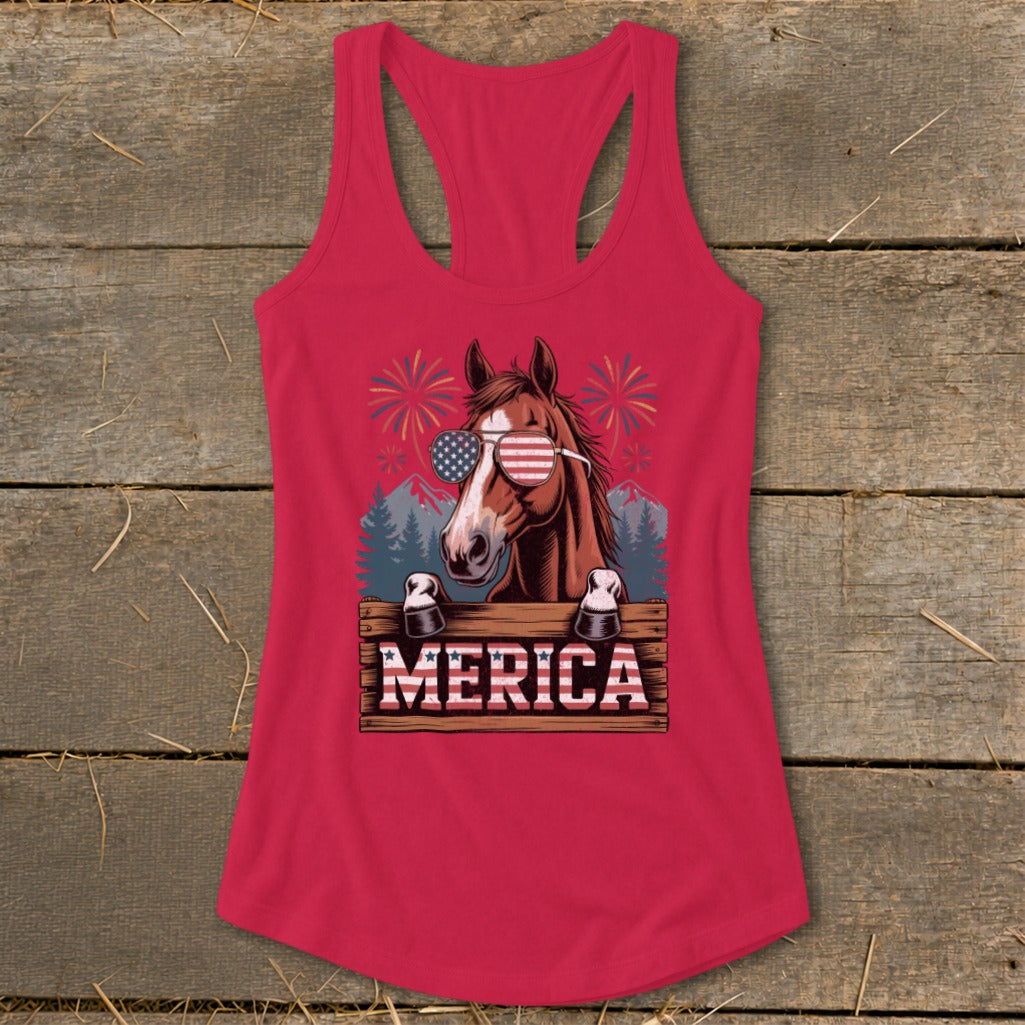 Horse wearing American flag sunglasses and "MERICA" text with fireworks background.