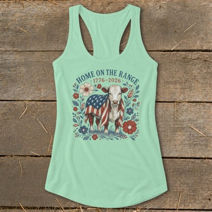 Cow draped in American flag, surrounded by flowers, with text "Home on the Range 1776-2026".