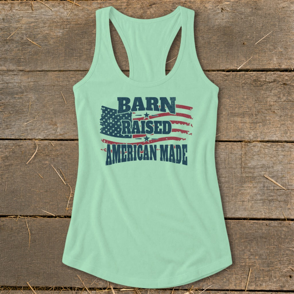 Mint green tank top with "BARN RAISED AMERICAN MADE" text and American flag graphic.