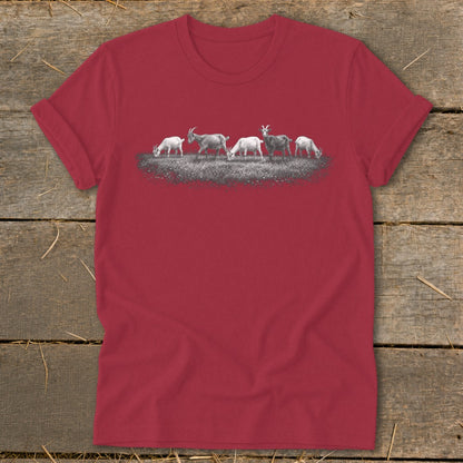Red t-shirt with a line of five goats grazing on a patch of grass.