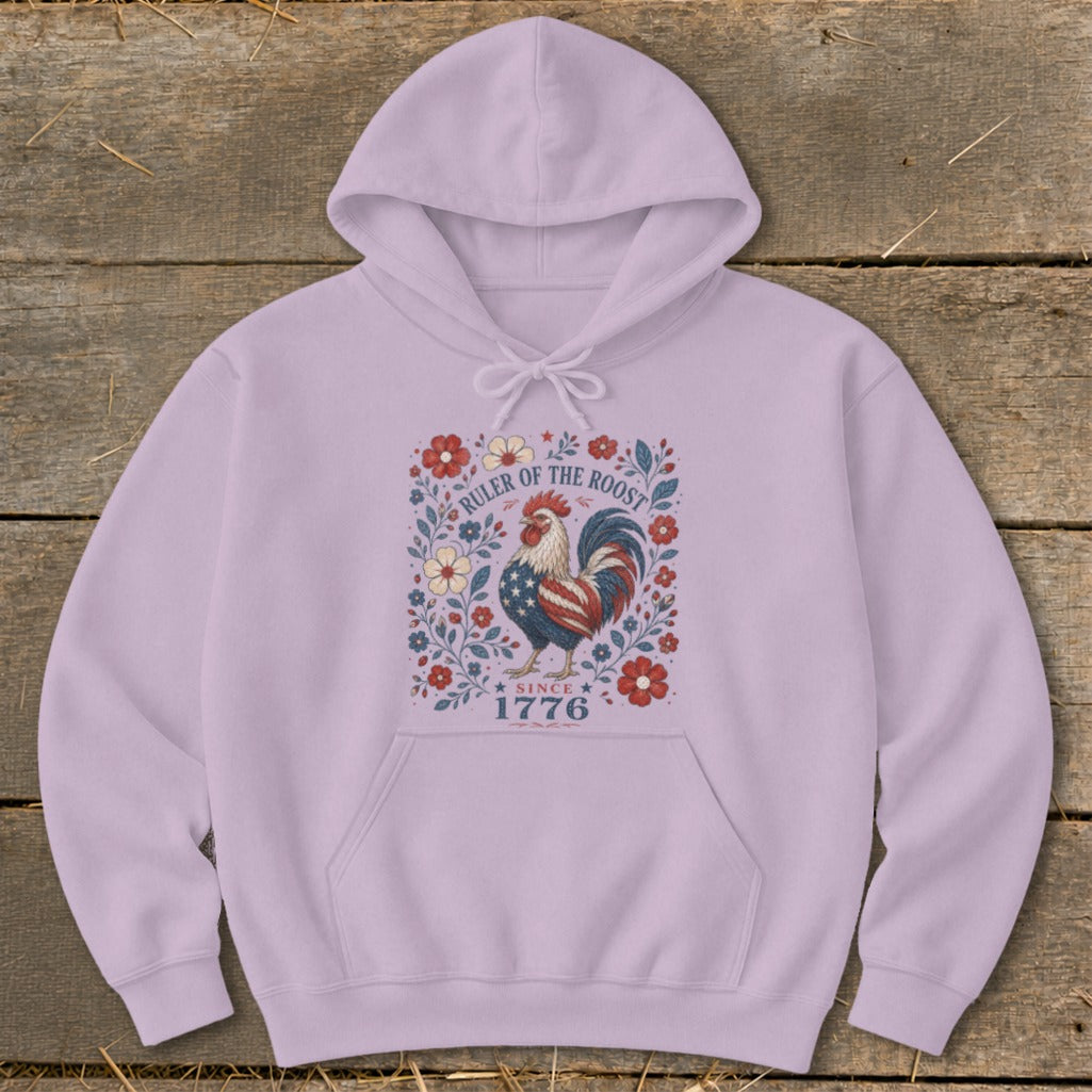 Purple hoodie with patriotic rooster and floral design, text reads "Ruler of the Roost Since 1776".