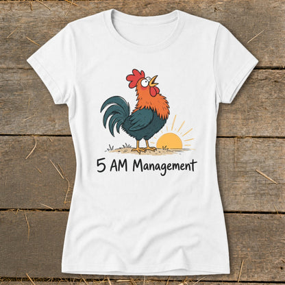 White t-shirt with a cartoon rooster crowing at sunrise and text "5 AM Management".