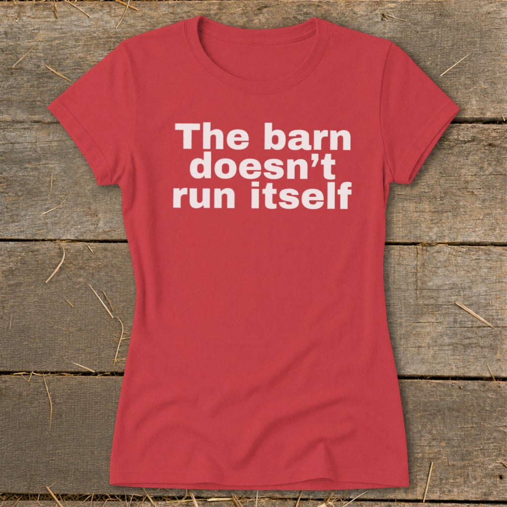 Red t-shirt with white text "The barn doesn't run itself."