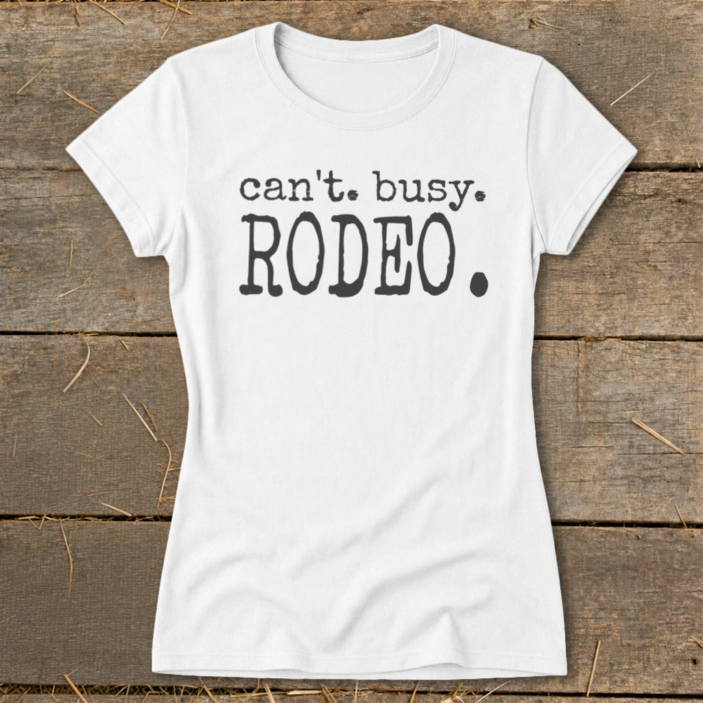 White t-shirt with black text "can't. busy. RODEO."