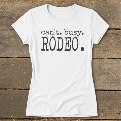 White t-shirt with black text "can't. busy. RODEO."