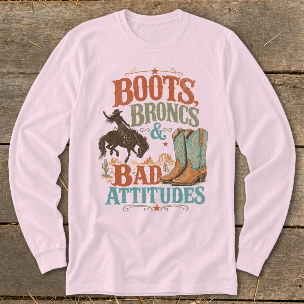 Long sleeve shirt with "Boots, Broncs & Bad Attitudes" graphic.