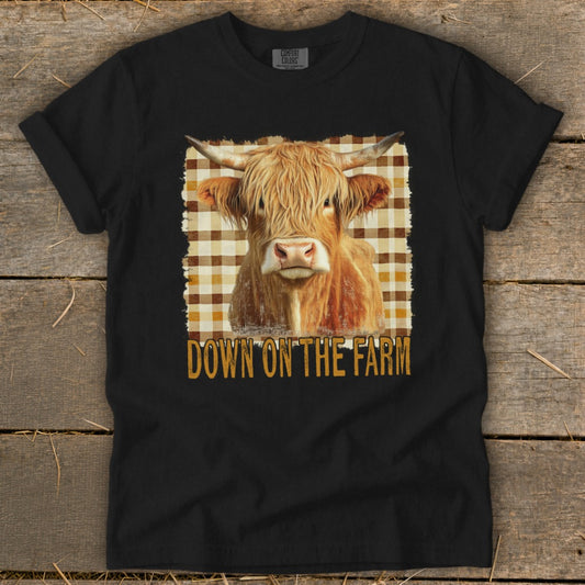 Black t-shirt with Highland cow graphic and "DOWN ON THE FARM" text.