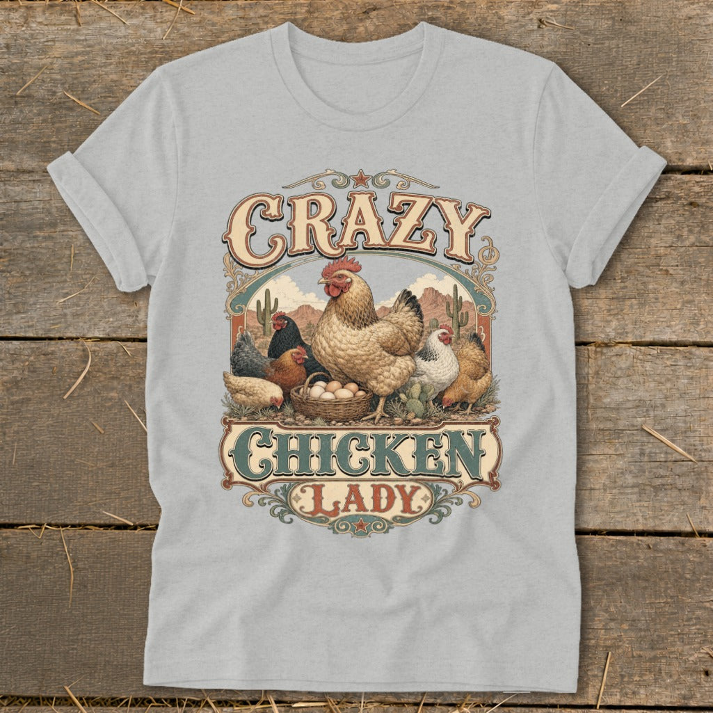 Crazy Chicken Lady graphic with chickens and eggs on a light grey t-shirt.