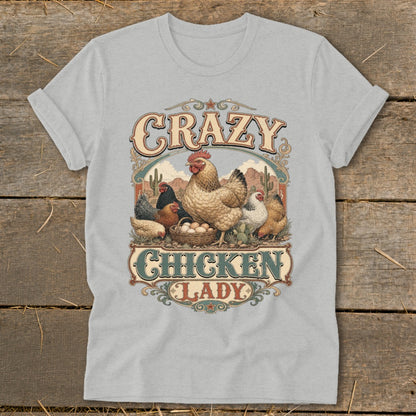 Crazy Chicken Lady graphic with chickens and eggs on a light grey t-shirt.