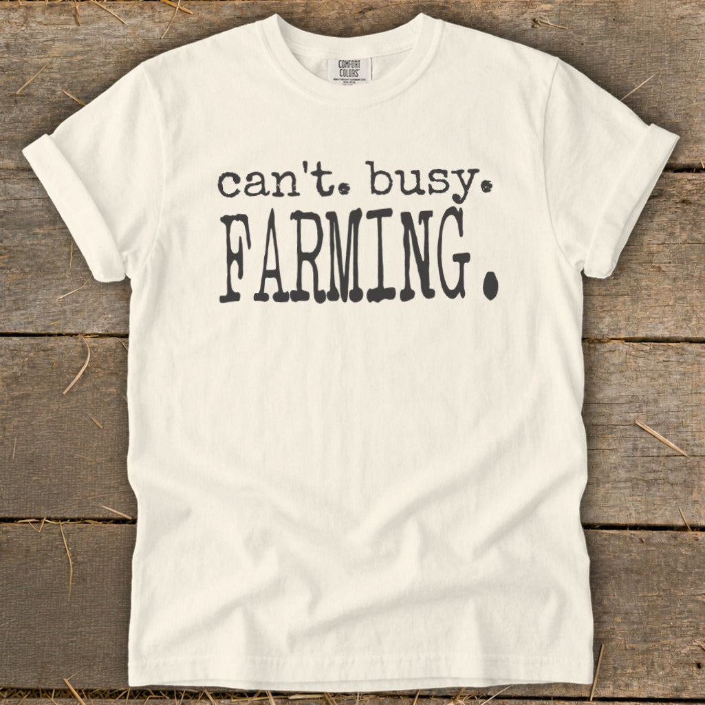 White t-shirt with text "can't. busy. FARMING."