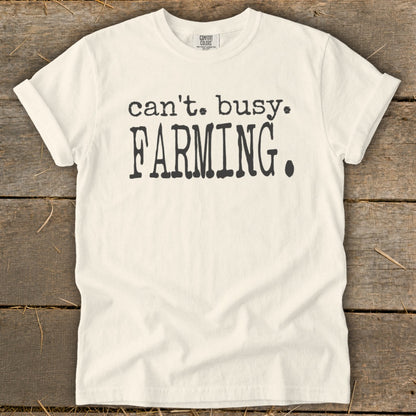 White t-shirt with text "can't. busy. FARMING."