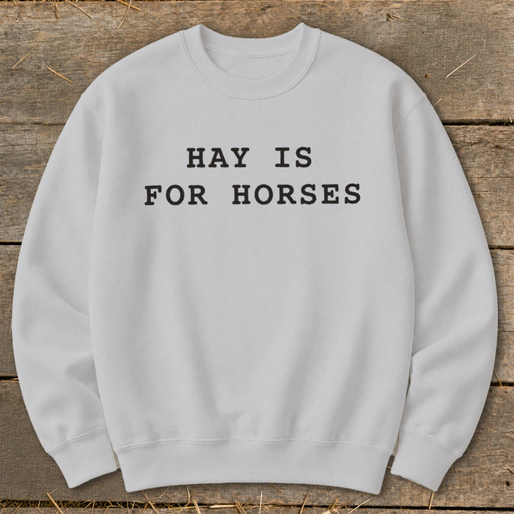 Light gray sweatshirt with black text that reads "HAY IS FOR HORSES".