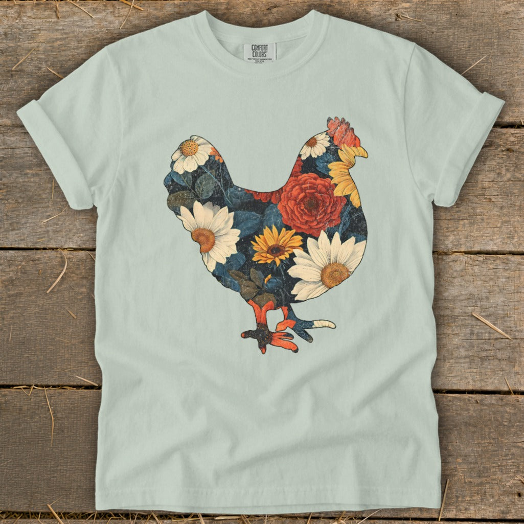 Light blue t-shirt with a floral chicken graphic and "COMFORT COLORS" tag.