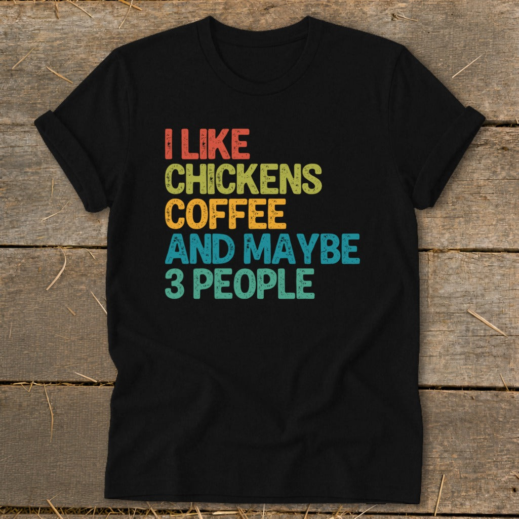 Black t-shirt with "I like chickens coffee and maybe 3 people" text.