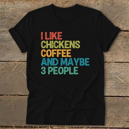 Black t-shirt with "I like chickens coffee and maybe 3 people" text.