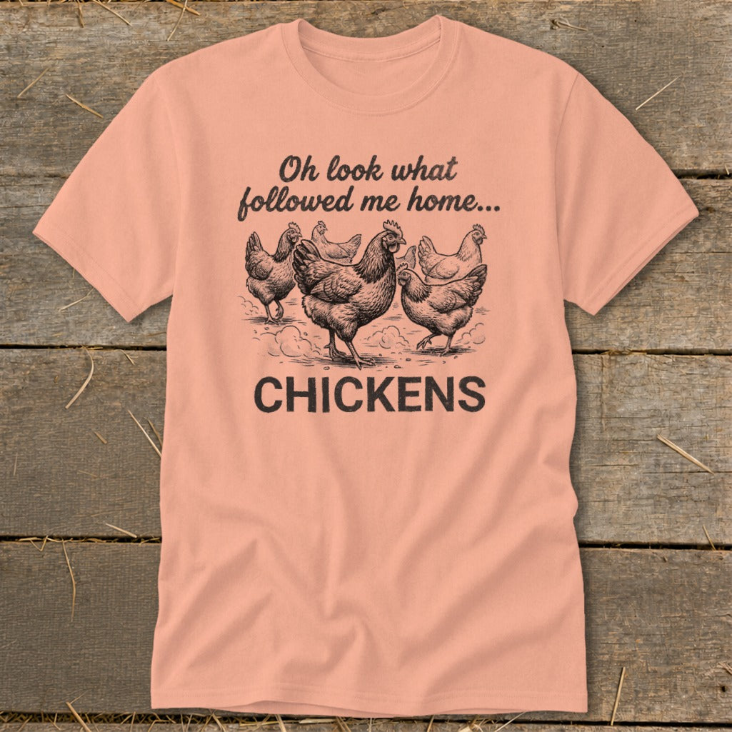 Peach t-shirt with drawing of chickens and text "Oh look what followed me home... CHICKENS".