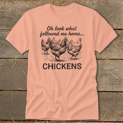 Peach t-shirt with drawing of chickens and text "Oh look what followed me home... CHICKENS".