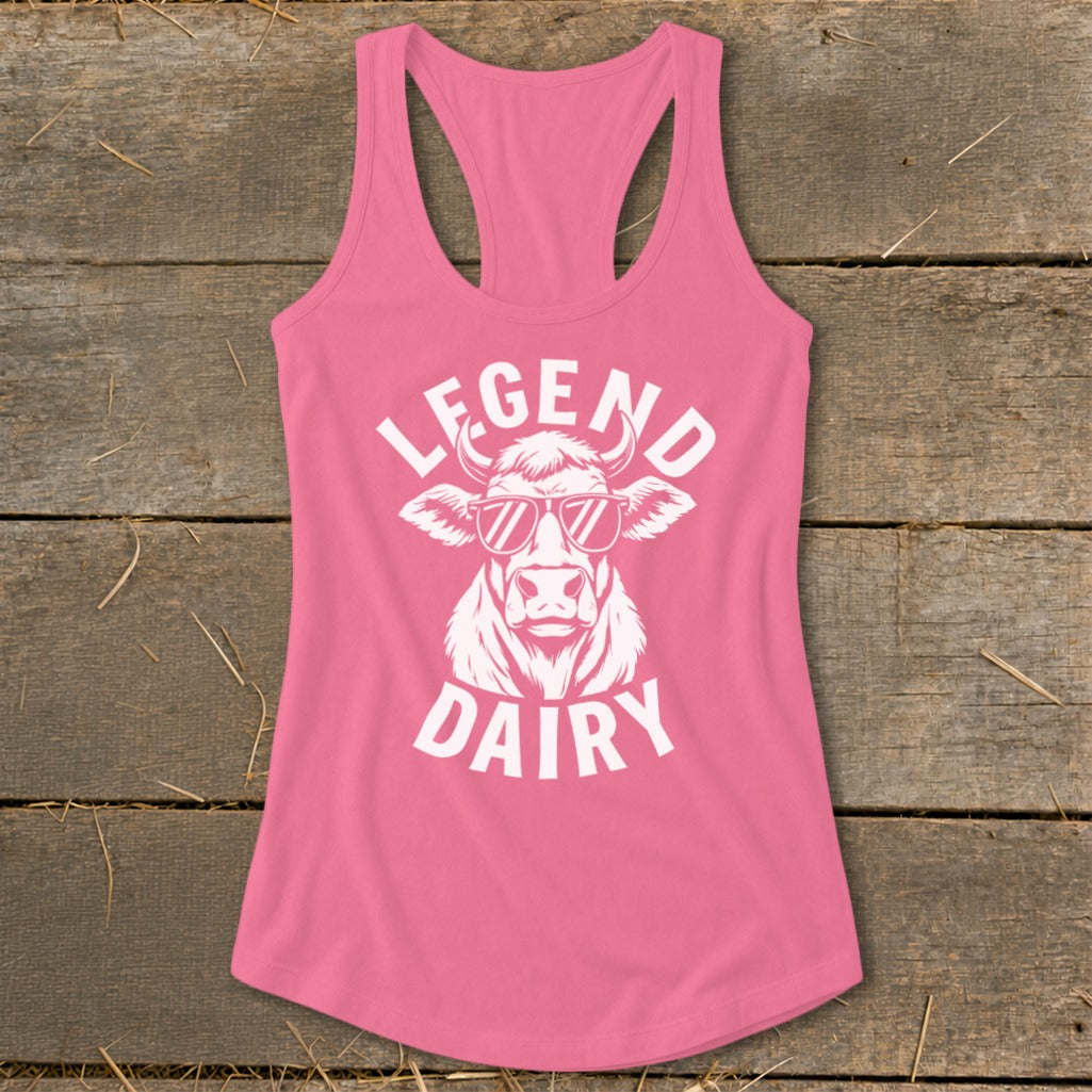Pink tank top with white graphic of a cow wearing sunglasses and text "LEGEND DAIRY".