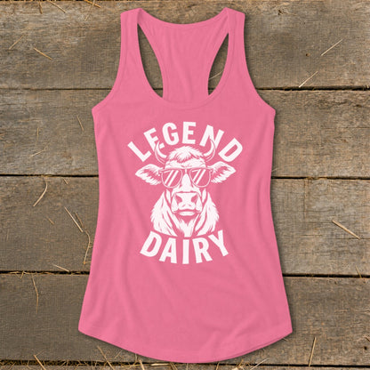 Pink tank top with white graphic of a cow wearing sunglasses and text "LEGEND DAIRY".