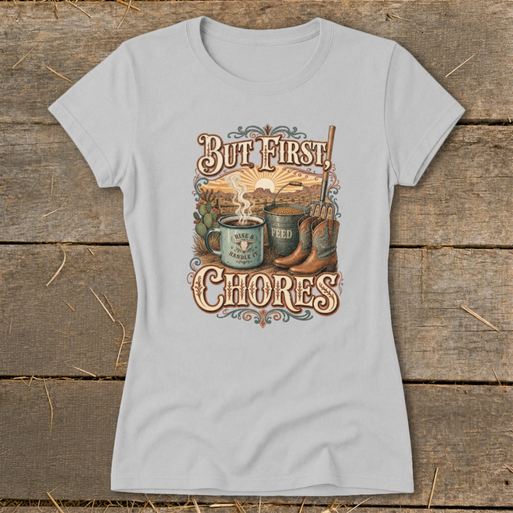 But first chores t-shirt graphic with cowboy boots, coffee mug, and feed bucket.