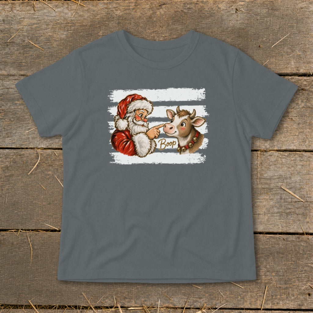 Santa playfully boops a cow's nose with the word "Boop" written on the image.