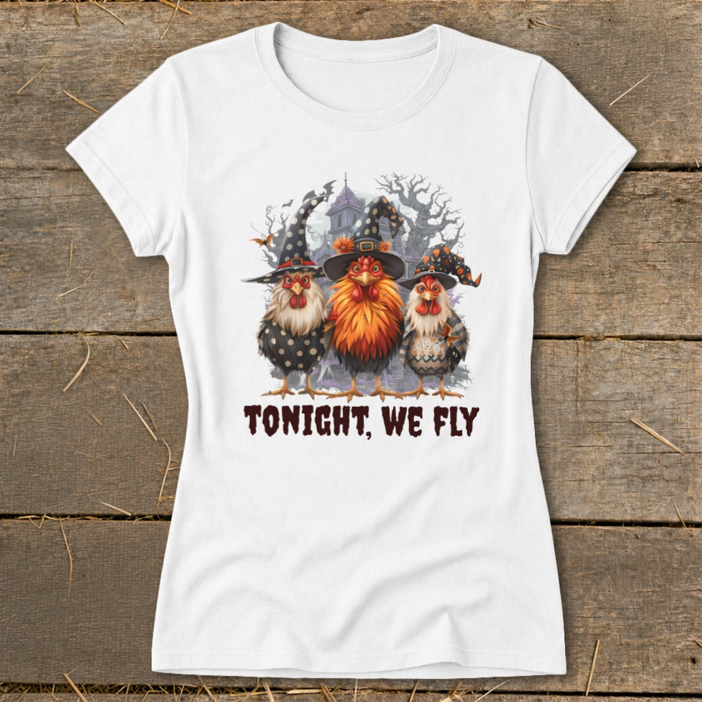 Three chickens in witch hats and Halloween-themed shirts with "TONIGHT, WE FLY" text.