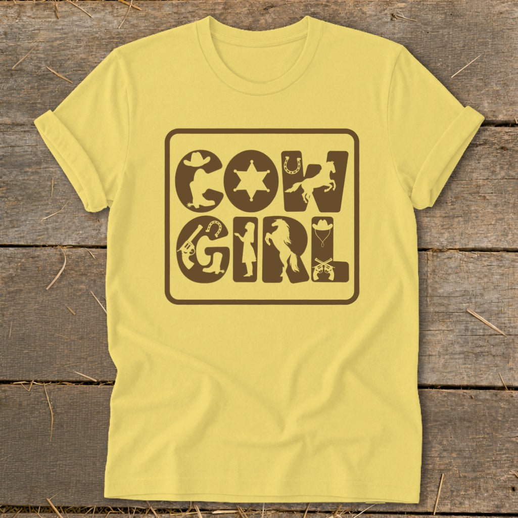 Yellow t-shirt with brown "Cowgirl" text design featuring western icons.
