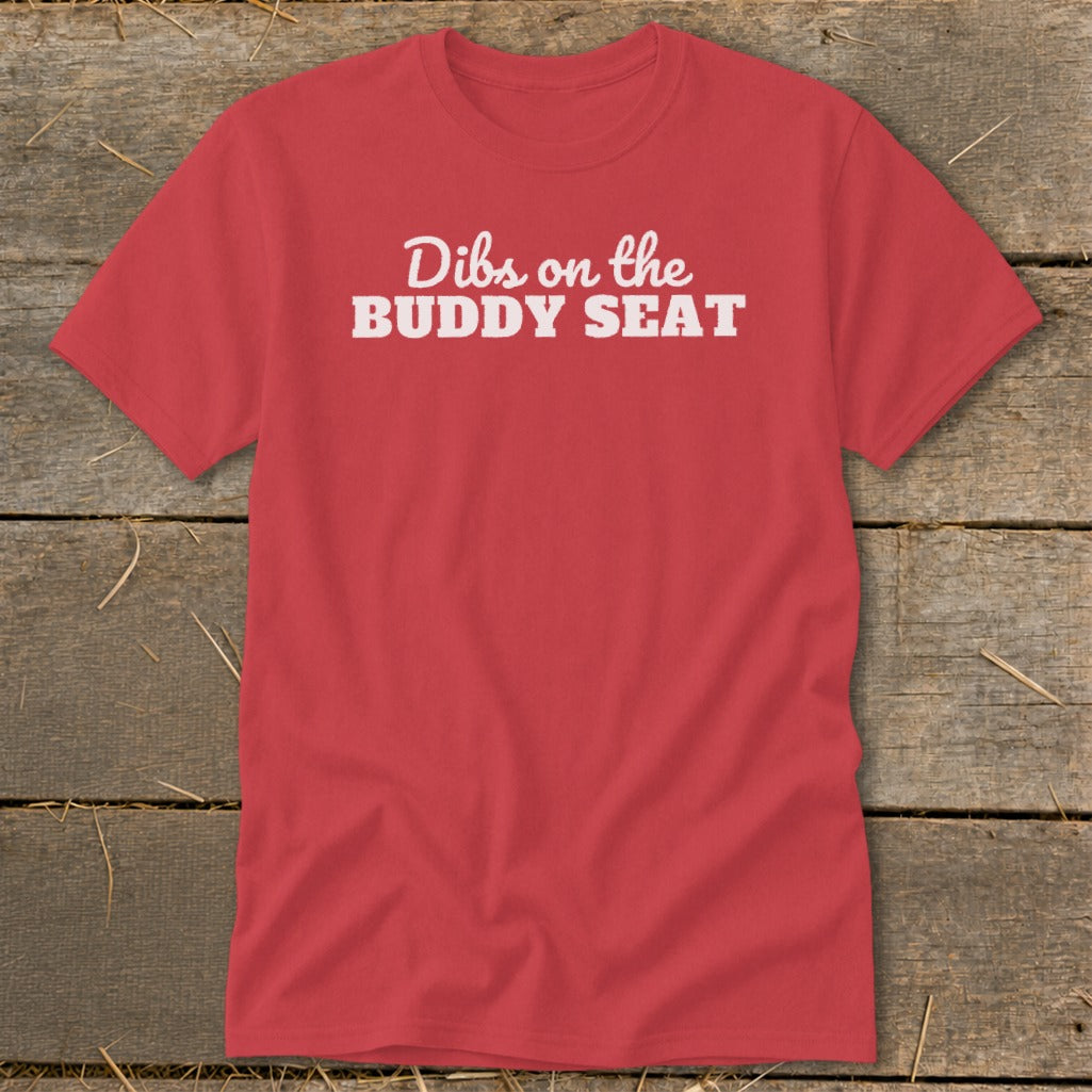Red t-shirt with white text reading "Dibs on the BUDDY SEAT".