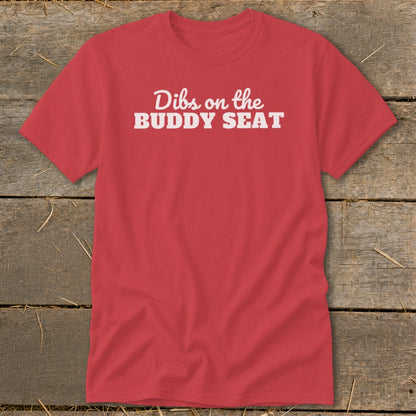 Red t-shirt with white text reading "Dibs on the BUDDY SEAT".