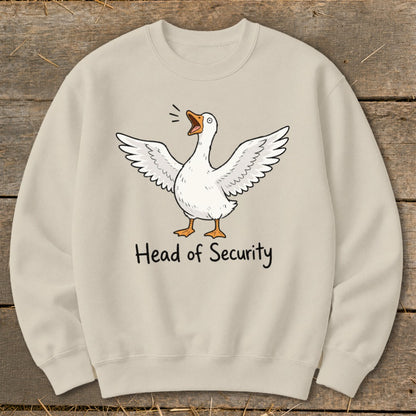 Light beige sweatshirt with a cartoon goose and the text "Head of Security".