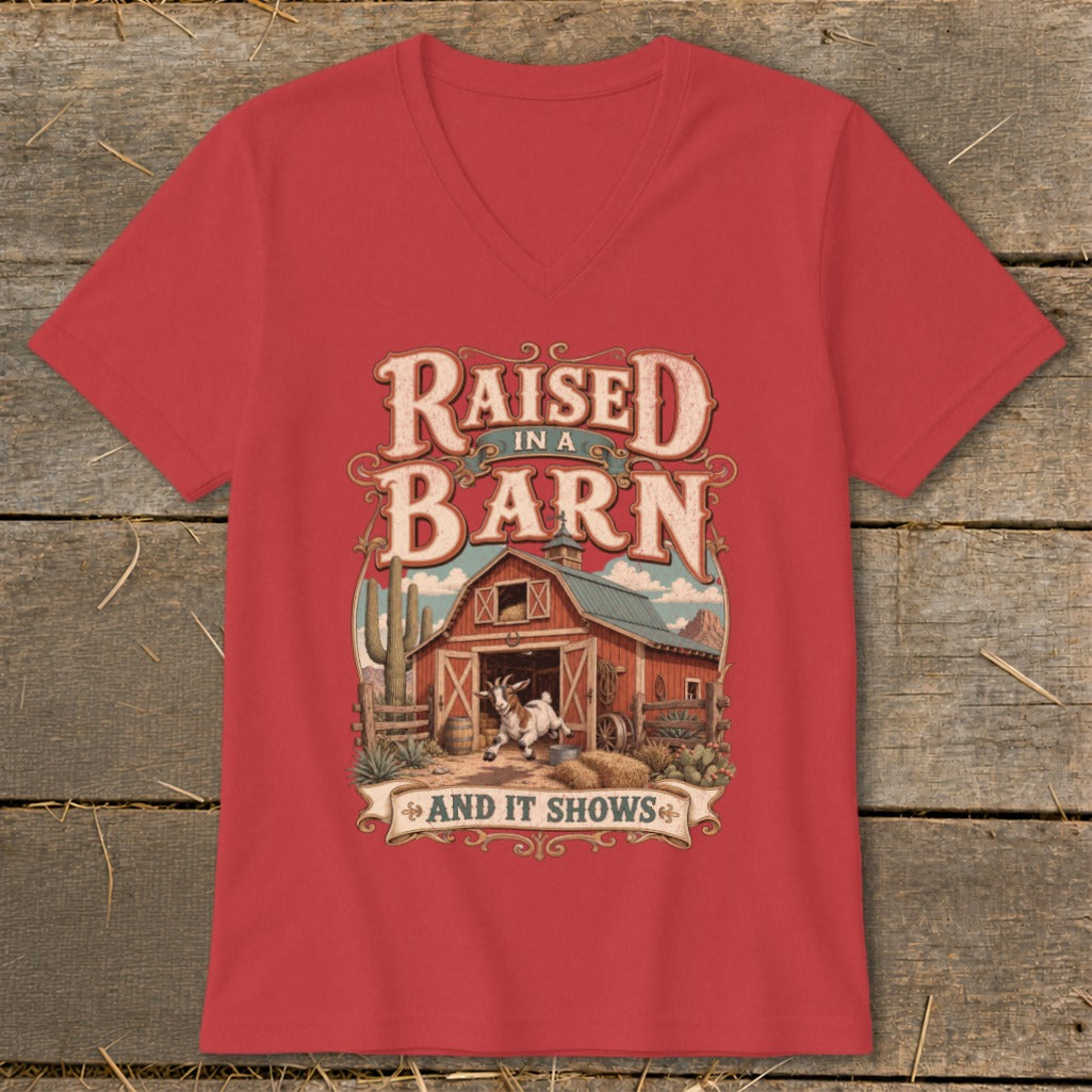 Red t-shirt with "Raised in a Barn and it Shows" text and barn graphic.