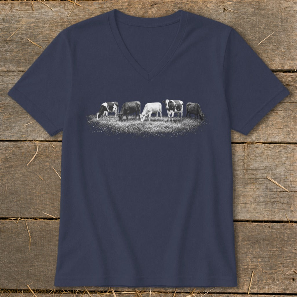 Navy v-neck t-shirt with a black and white line of grazing cows on a field.